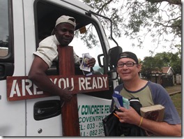 Malawian Osten poses with his Christian literature and KJB New Testament