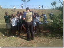 Gary handing out Gospel cards at Piet Retief Primary School